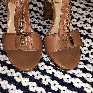 Worn a few times. In great condition! Brown Michael Kors Berkeley T Strap heels